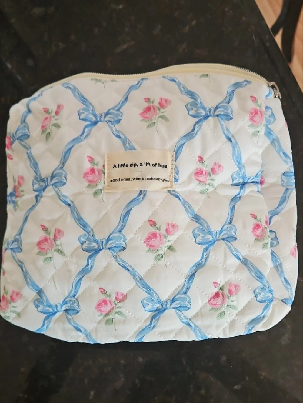 NWOT Quilted Floral Cosmetic Pouch in White with Blue Ribbon Print